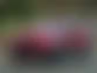 red 2026 Mazda CX-50 Hybrid exterior front three quarter