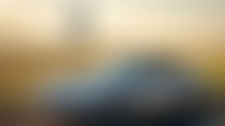 1998 Ferrari 550 Maranello front three quarter exterior image at sunset at an airport