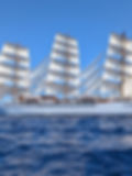 Sea Cloud Spirit sailing under full sail off the coast of Sicily