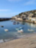Mousehole Harbour in the sunshine