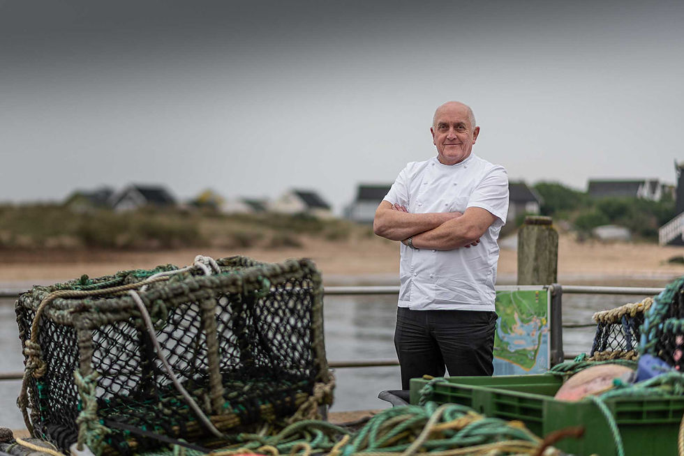 Chef patron Alex Aitken among the fishing gear just a few hundred metres from his restaurant, The Jetty
