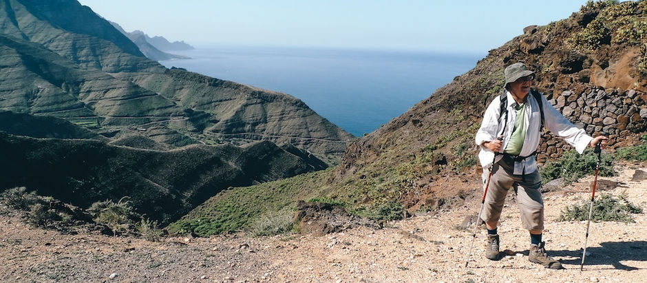 a walker high in the coastal mountains of Gran Canaria