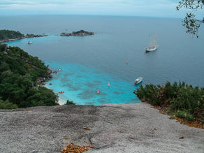 Panoramic view of white sand beach and turquoise water at Similan Islands Thailand