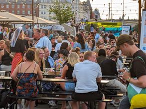 Crowds eat out in Copenhagen on a summer night