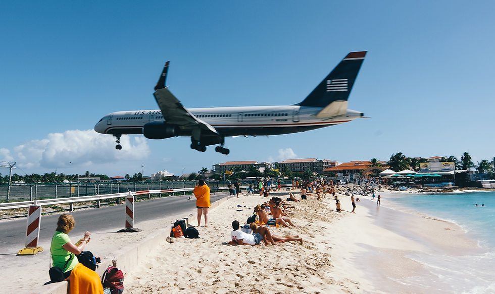 Maho Beach offers a rather unusual experience for beachgoers, with passenger jets flying remarkably low overhead