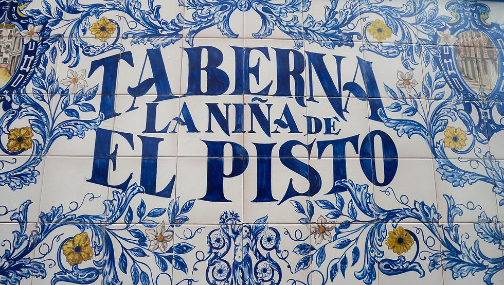 Tiled taverna sign in central Marbella