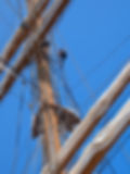 Crew climb the mast of Sea Cluod Spirit