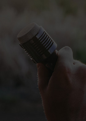 Holding a Mic_edited.jpg