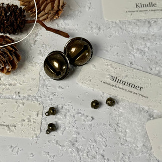 Twelve words with pinecones and bells