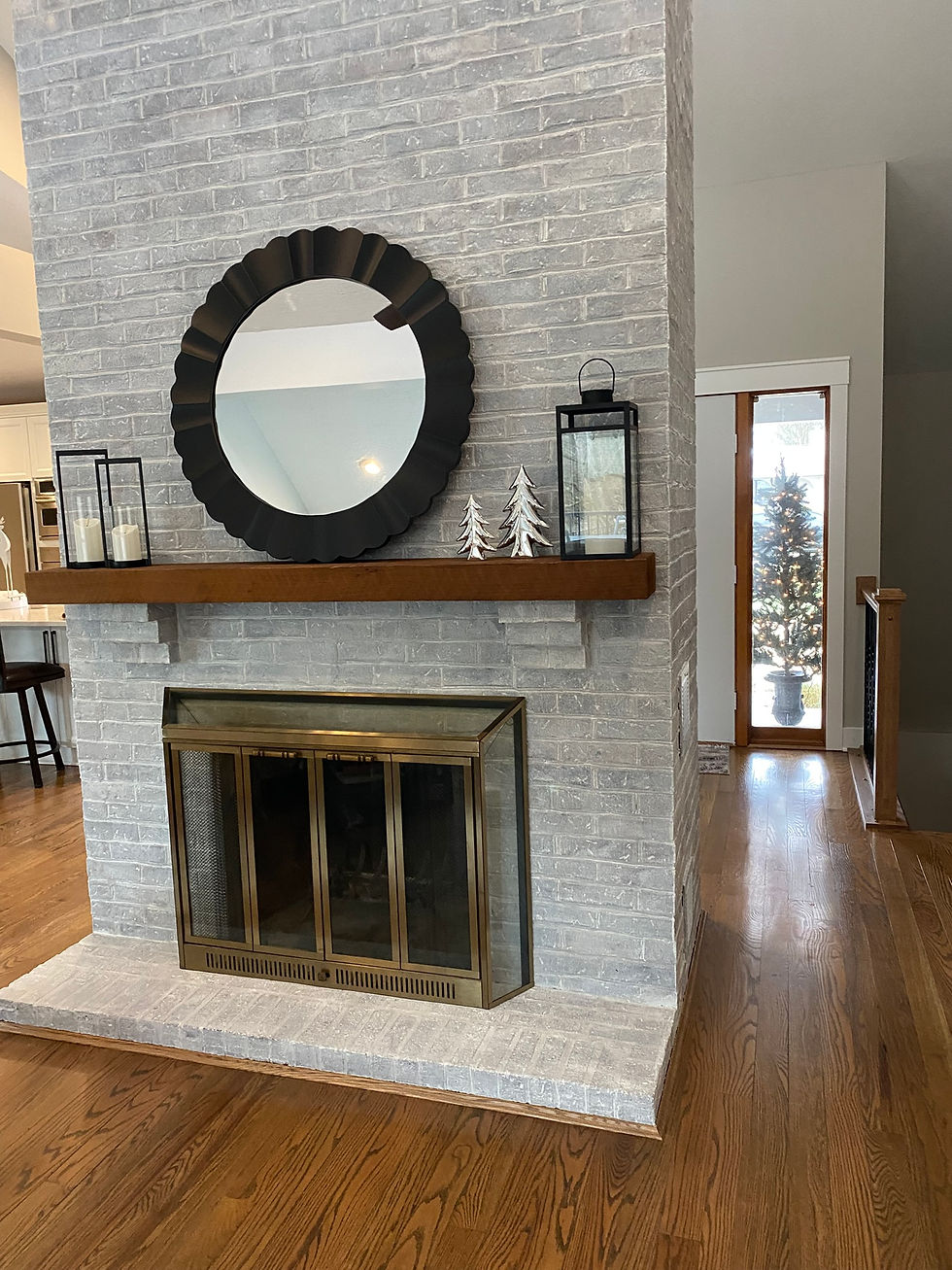 Brick whitewash painting on fireplace