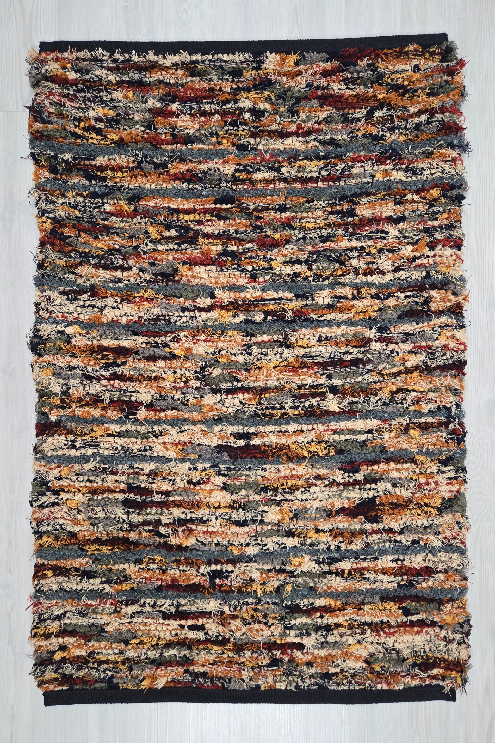 Handwoven Rug 30" wide (browns, cream, gold, black, gray)