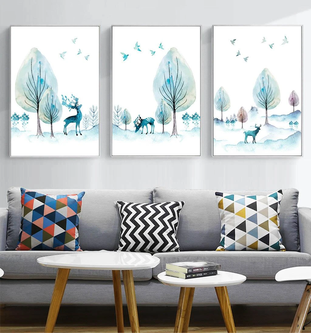 סט 3 תמונות קיר לבנות של נוף כחול עם אילים עצים ציפורים על קנבס לסלון או לקליניקה דגם 3728472