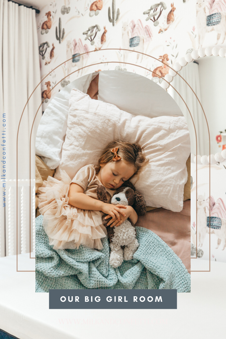 Our little girl is growing up and we put together this girly boho big girl room! Filled with soft linen bedding and a Jenny Lind bed frame, this boho bedroom is complete! Some elements you have to see from this lovely bedroom, include: silk and snow mattress magic linen sheets waffle throw blanket Jenny Lind crate and barrel bed llama wallpaper cuddle and kind dolls white custom drapery modern white rocking chair round wooden ball mirror and book ledges