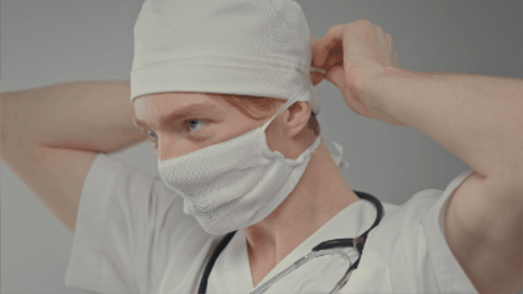 Doc putting on Mask.gif