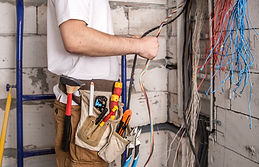 electrical electrician working near boar