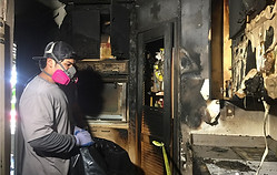 fire damage cleanup worker contractor we