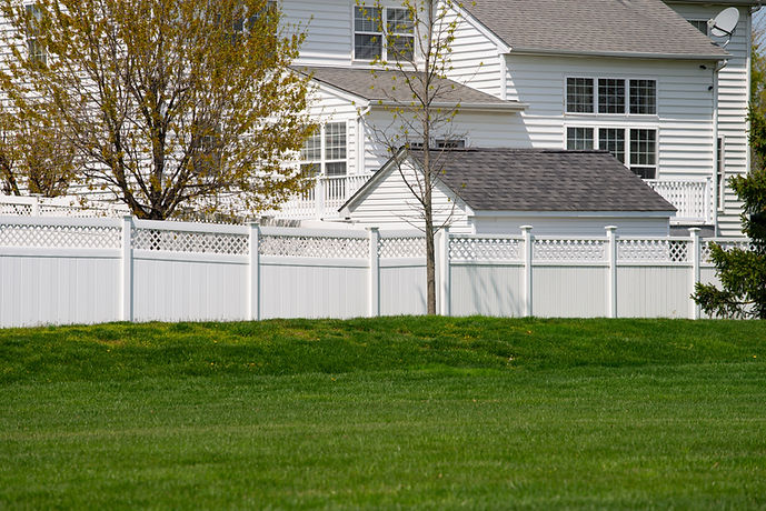 mega garage door white plastic fence vinyl modern landscape.jpg
