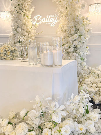 Romantic wedding decor at The Orchard featuring Cloud Sixty Events top table decoration