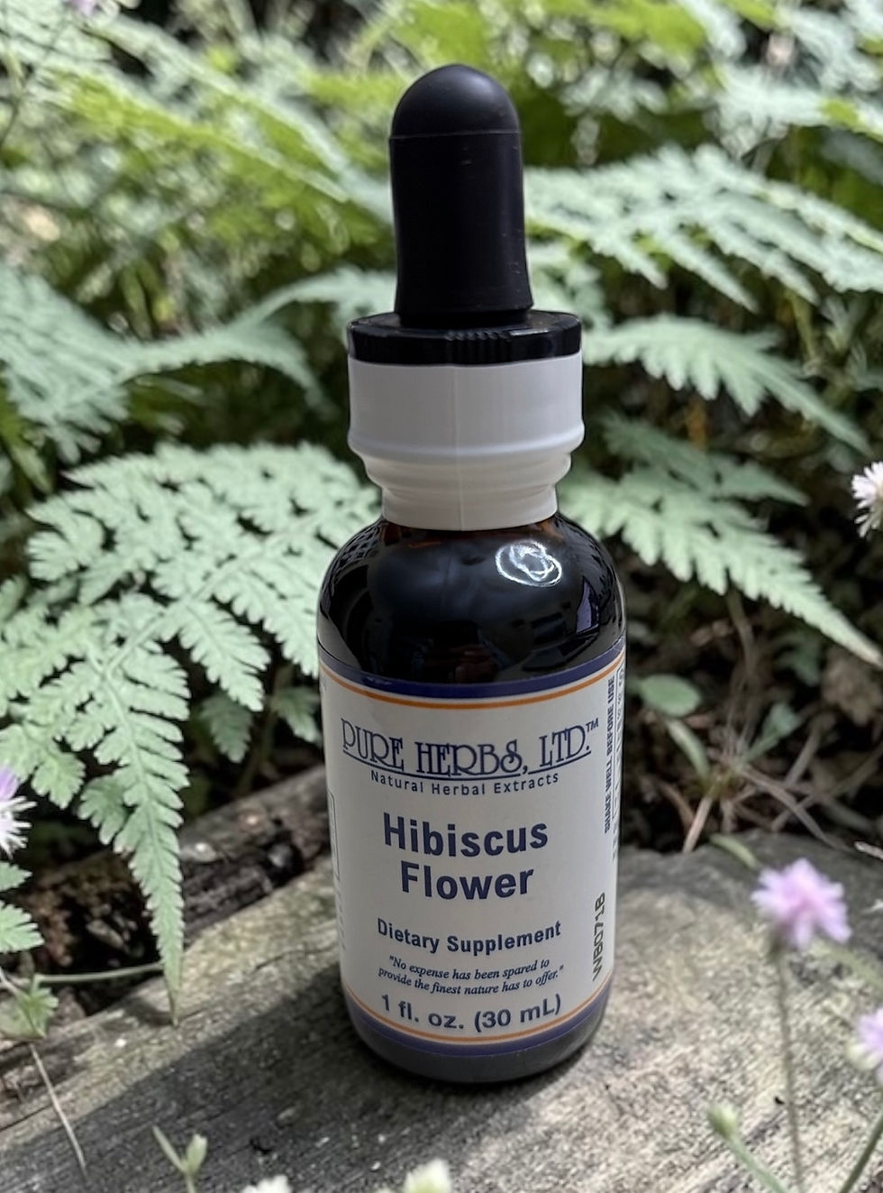 Hibiscus flower herbal extract bottle front view