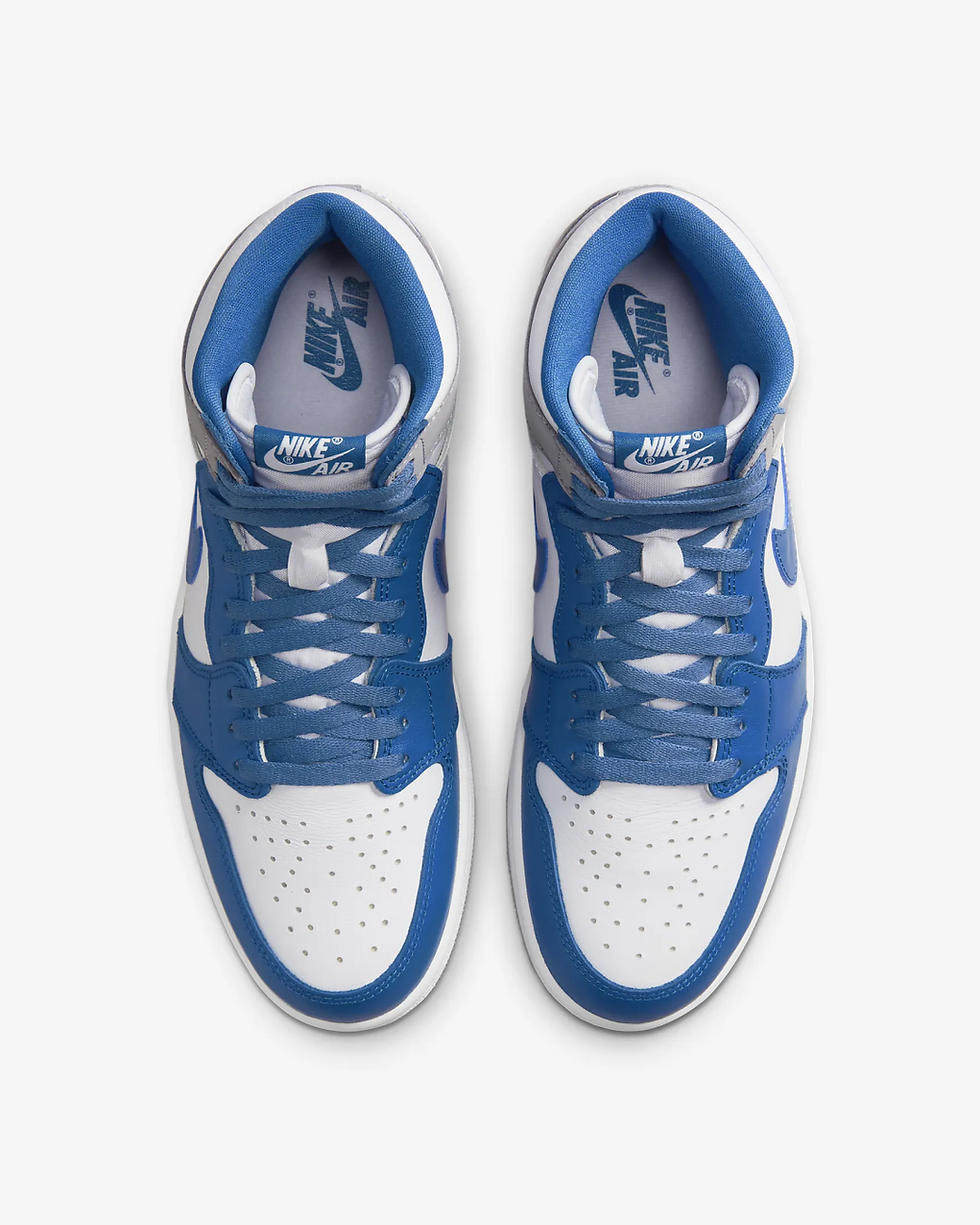 Blue and white Air Jordan 1 high-top sneakers, overhead shot.
