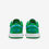 Thumbnail: Green and blue Air Jordan 1 Low shoes, rear view, white background.