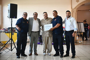 Festejan con misa, desfile y convivio a bomberos en su día