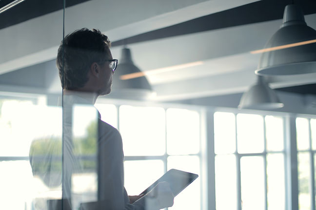 Person in board room, article Cyber security in private equity