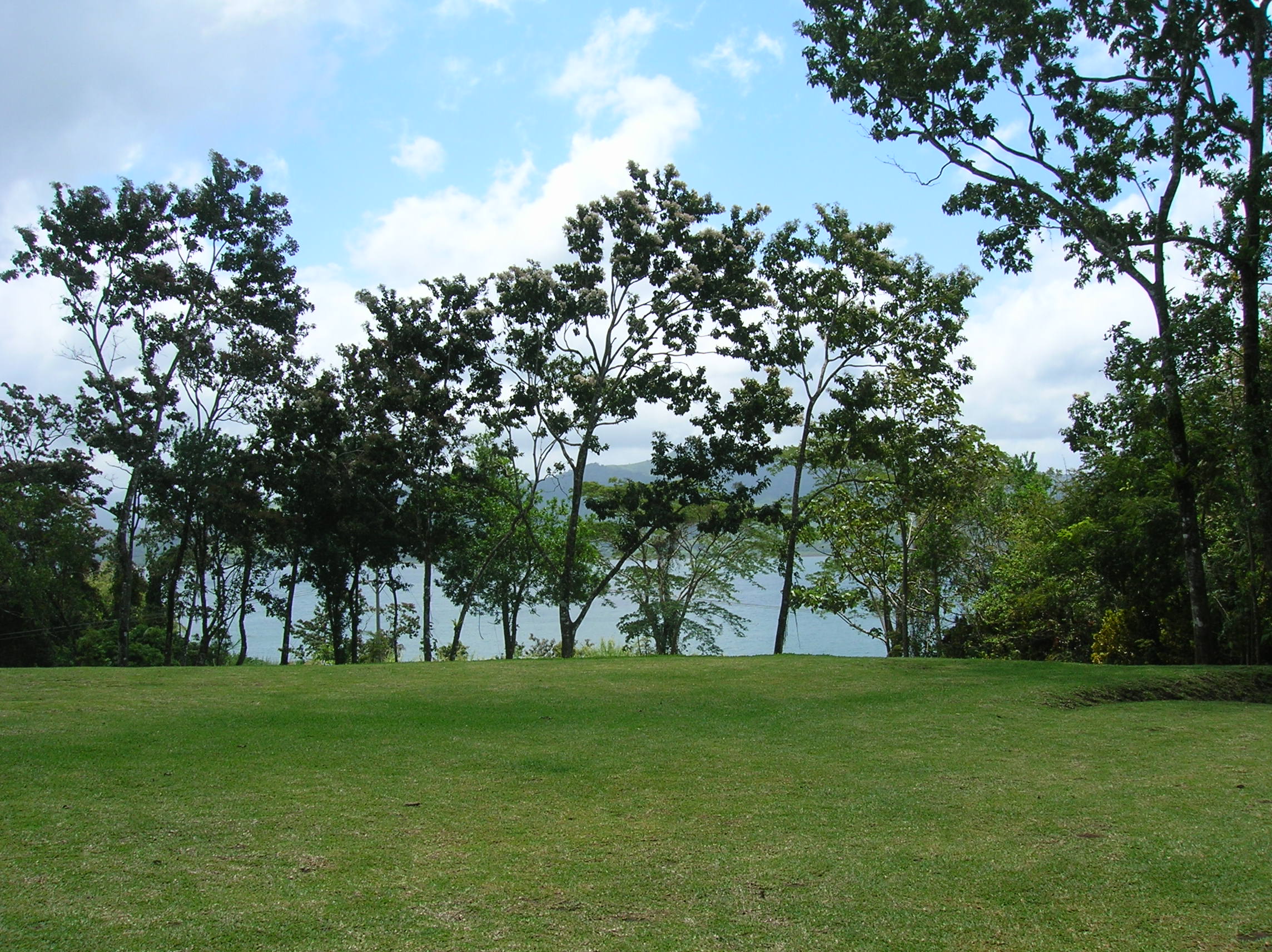 Prime Acreage directly on the Lake and Main Road In Nuevo Arenal