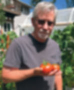 "The Garden Father" with fruits of his labor