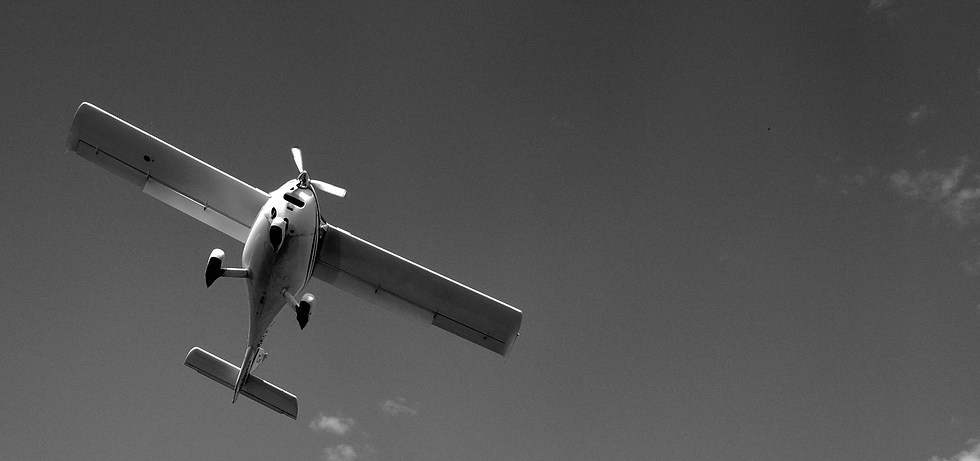 Bottom of the airplane against the sky_edited_edited_edited.png