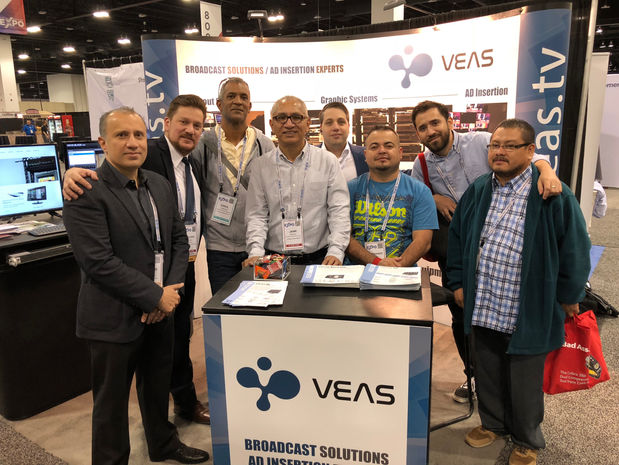 Veas.tv team at their broadcast solutions trade show booth