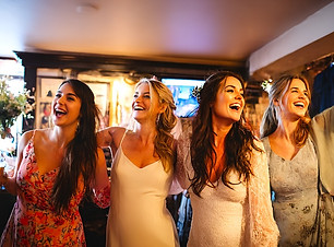 wedding guests enjoy a singing waiter