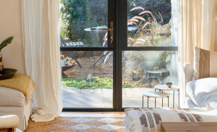 The french doors from the inside. The flush-level threshold here means the inside of the house is the same level as the outside.