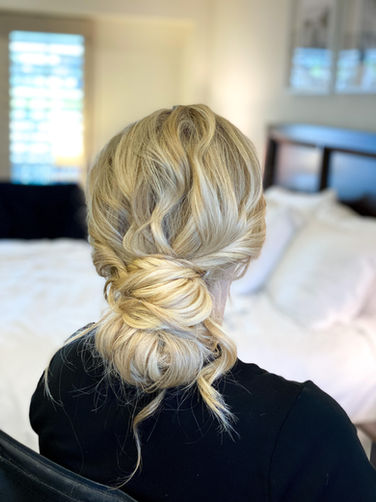 Yosemite Hairstylist creates effortlessly romantic boho bridal updo.