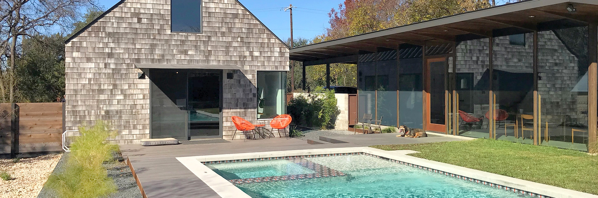 OES | pool, composite decking, steel retaining walls, texas basalt and salt and pepper riverstone gravels, zoysia turf grass, drought tolerant vegetation
