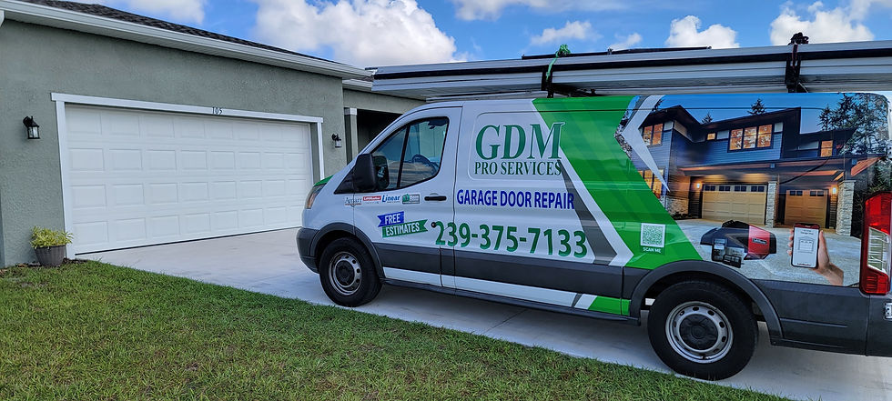 Close-up view of a garage door spring being replaced