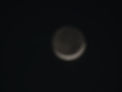 An earthshine of a crescent moon.jpg