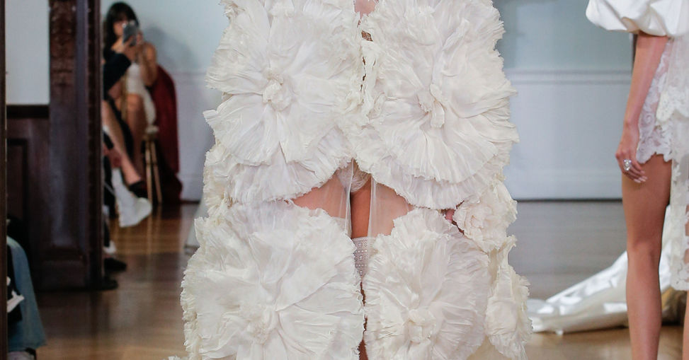 Monique Lhuillier Fall 2026 Bridal Paisley cape — official runway image