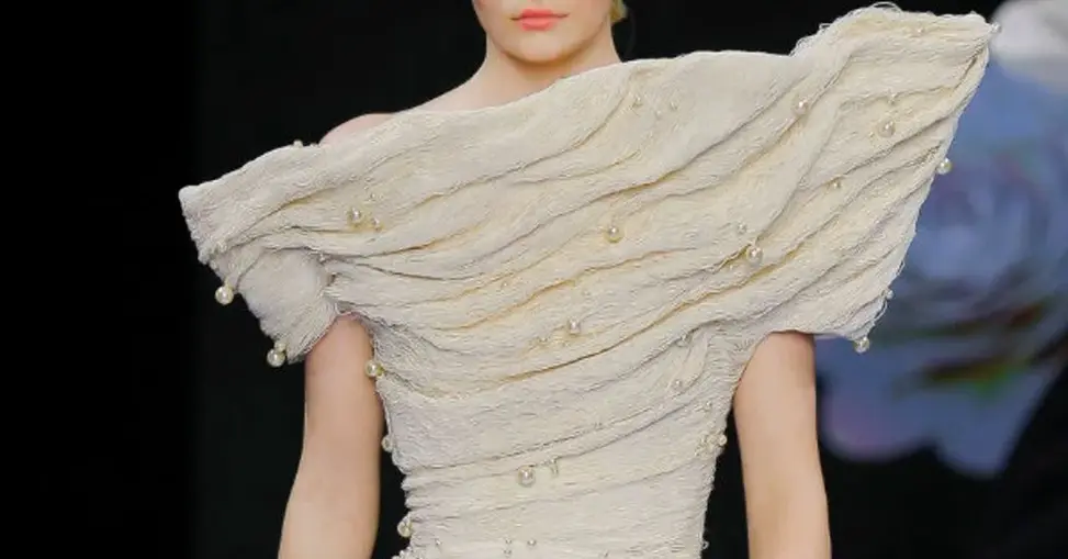 Isabel Sanchis bridal couture wedding gown showcasing luxury craftsmanship, elegant details, and contemporary bridal design