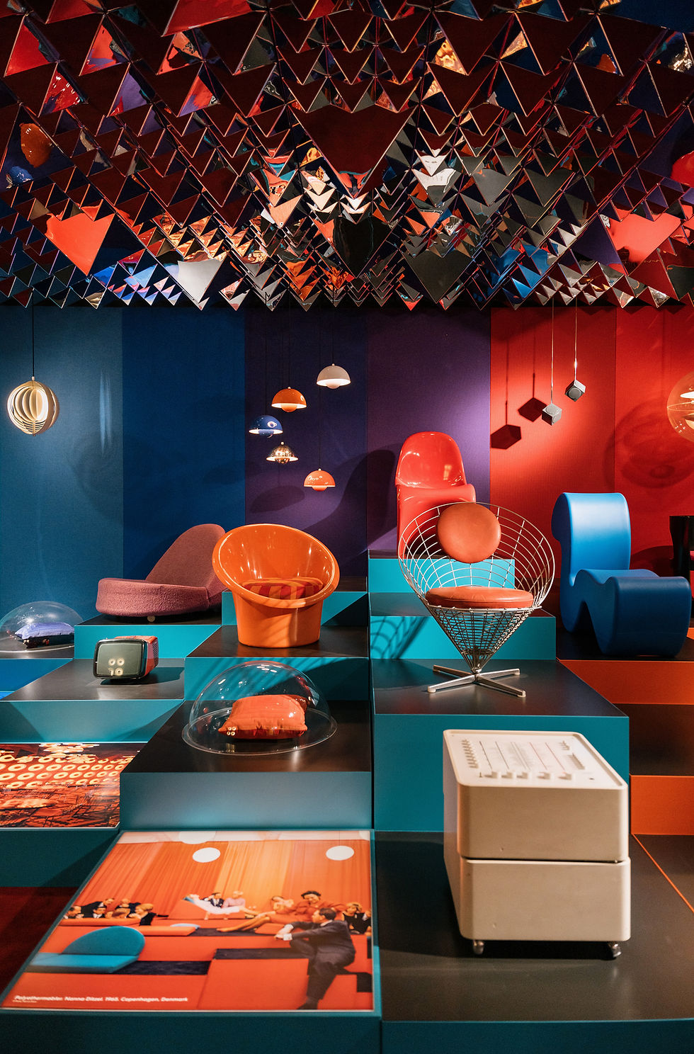 A colourful interior in Danish Modern brings together chairs, lamps and objects.