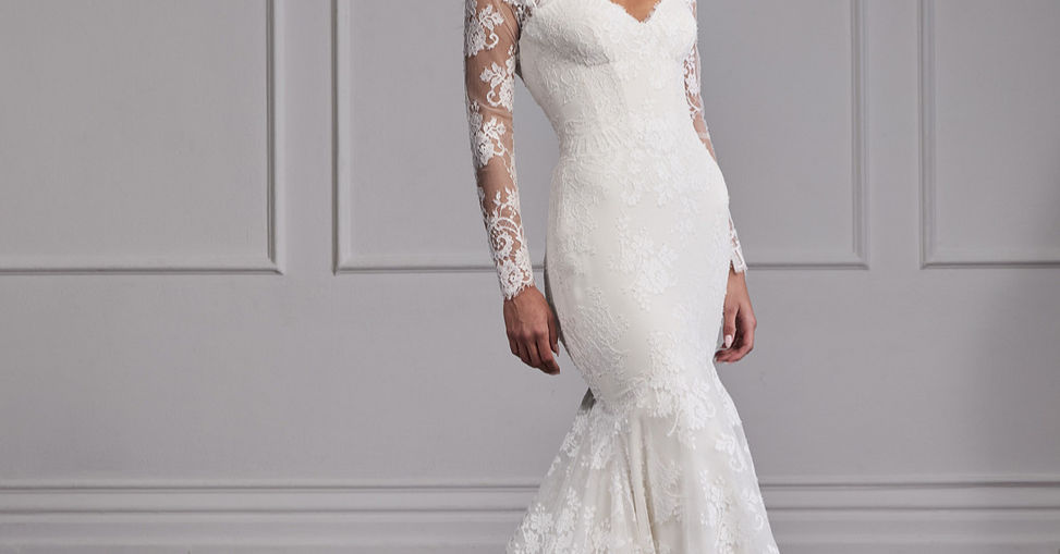 Suzanne Neville bridal couture wedding gown showcasing luxury craftsmanship, elegant details, and contemporary bridal design