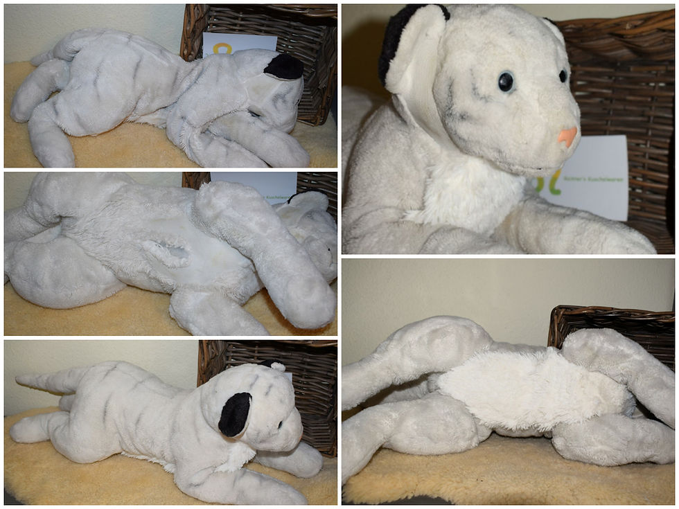 Dieser grosse weisse Tiger kam zu mir mit einem offenen Bauch. Ich habe ihn gewaschen und ein wenig Fellpflege betrieben. Da der Stoff da schon sehr dünn war, habe ich den kompletten Bauch von Hand mit neuem Stoff umnäht, damit er wieder kuschlig-weich ist und nach Hause konnte.