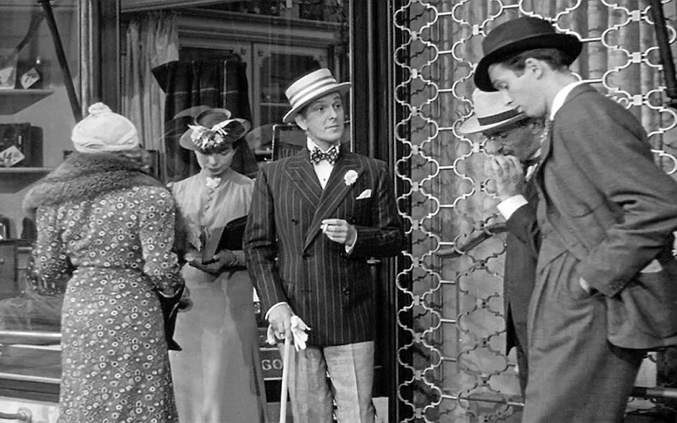 Inez Courtney, Sara Haden, Joseph Schildkraut, Felix Bressard, and James Stewart wait for the store to open in the classic Ernst Lubitsch movie Hollywood romantic comedy film "The Shop Around the Corner"