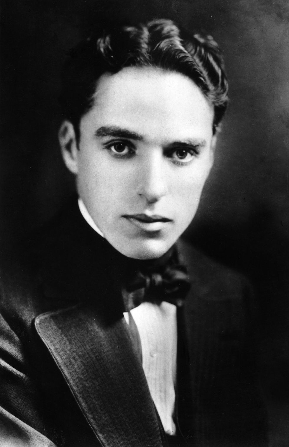 Early portrait photo of silent film icon Hollywood movie star writer, director Charles Charlie Chaplin young