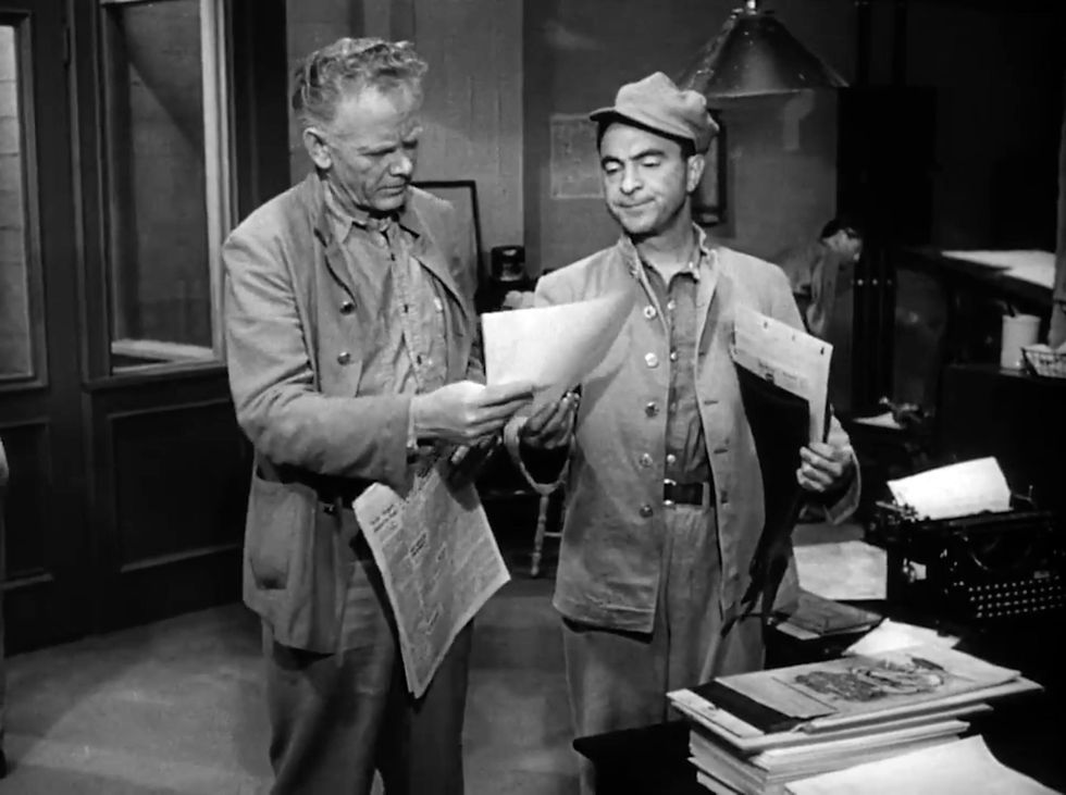 Charles Bickford and Sam Levene in the print shop in the classic prison movie Mark Hellinger film noir 1940s "Brute Force"