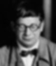 Portait photo of art director Universal Studios Hollywood set designer Gothic horror Charles D. Hall in glasses and bow tie