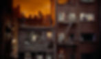 View of apartment buildings at dusk with lit windows showing people inside. Orange sky and cityscape in the background. Quiet, urban ambiance. Movie set of Greenwich Village New York City apartments in the Alfred Hitchcock classic Hollywood film suspense voyeuristic movie "Rear Window" Peeping Tom