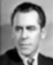Black and white portrait of a man in a suit and tie, gazing to the side. The background is plain, enhancing a serious and thoughtful mood. Portrait photo of Hollywood movie film director 1930s Jack Conway