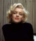 color portrait of Hollywood sex symbol blonde actress in black sweater icon movie star Marilyn Monroe