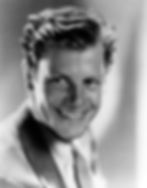 Smiling man in a suit, black and white portrait. Soft lighting, blurred background. Mood is positive and confident. Portrait photo of classic Hollywood film actor Western movie star young romantic leading man Joel McCrea